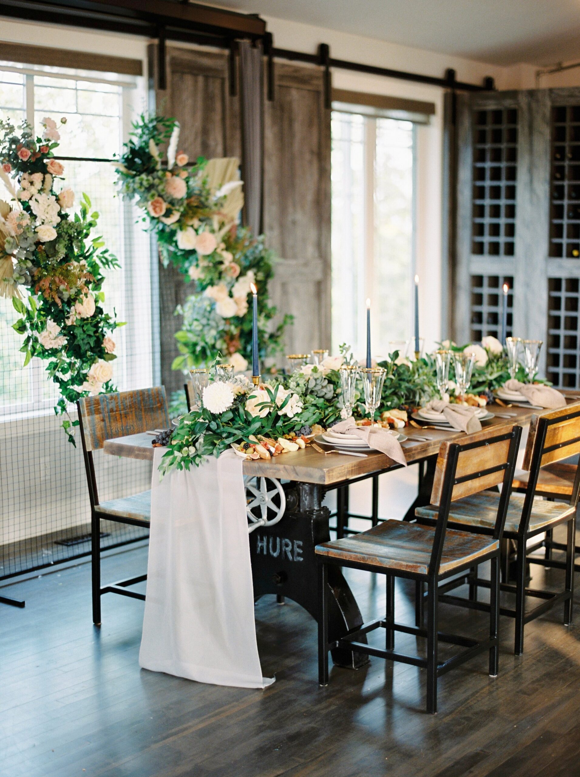  industrial table setting and floral screen | Rocky Mountain Bride Magazine Feature | The Rdige Okotoks Bridal Editorial | Boho hats | film photographer 