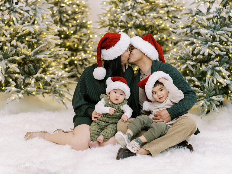 family christmas portrait in santa hat