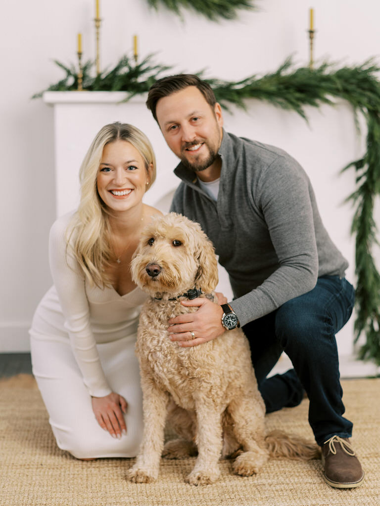 couples christmas portrait with dog