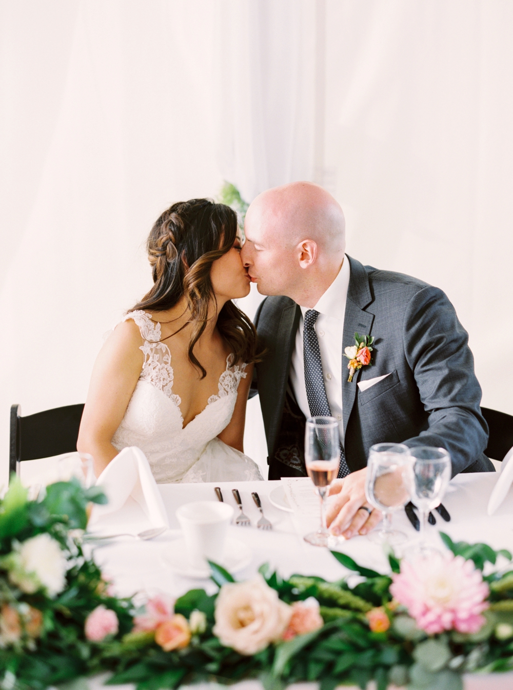 Calgary Wedding Photographer | Meadow Muse Pavilion Wedding | Canmore Photographers | Fish Creek Park Tent Wedding | Bride and groom kiss