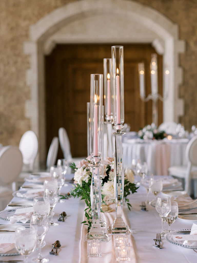 Venue space and reception decor at Fairmont Banffsprings Hotel. White and blush pink details