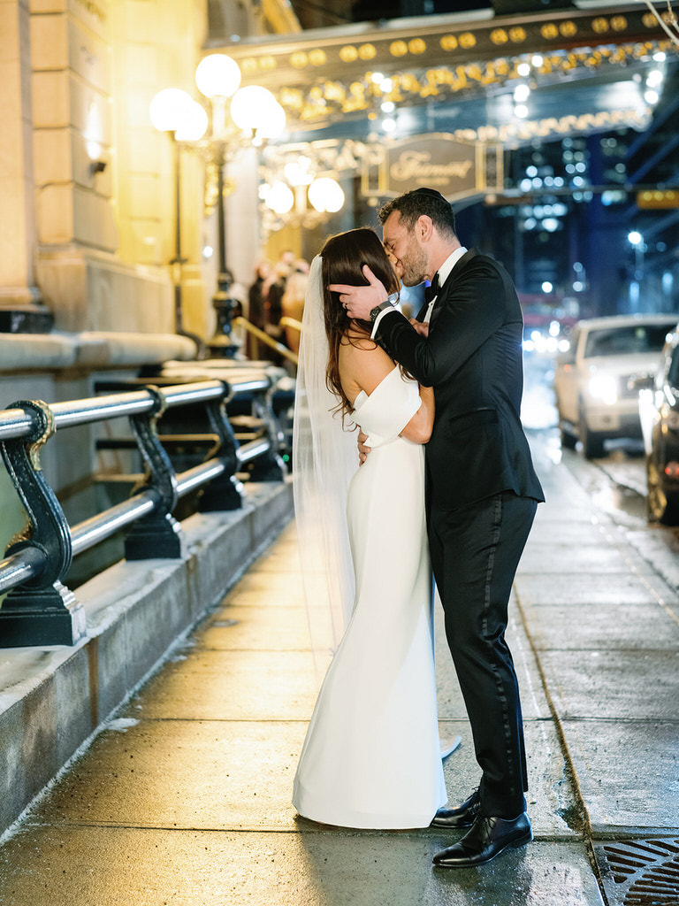 Portrait of Bride and Groom kissing - Downtown editorial style wedding photography