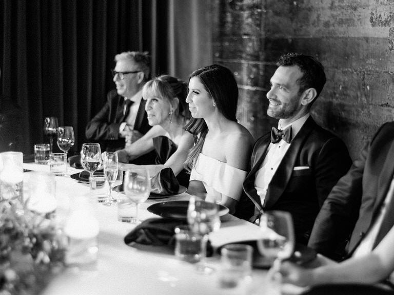 bride and groom, head table during wedding speeches, black and white