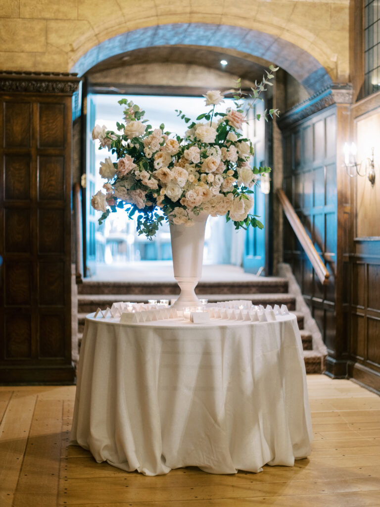 Escort card table display in Ivor Petrak room at the Fairmont Banff Springs Hotel captured by Banff Wedding Photographer Justine Milton